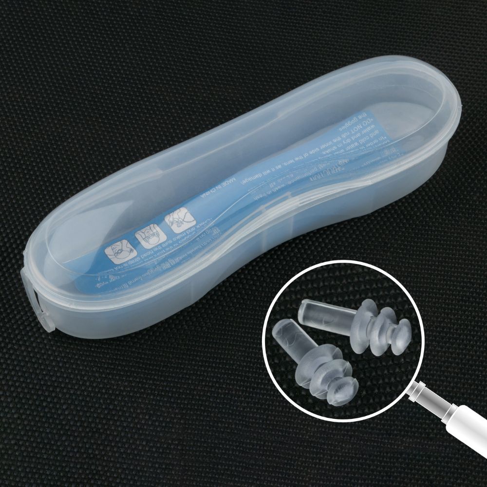 Clear EyeInsist Swimming goggles box with earbuds on a black background